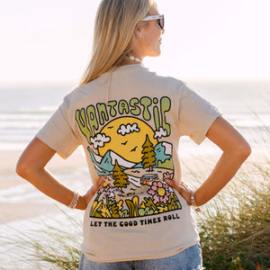 Woman wearing a t-shirt with a graphic design on the beach