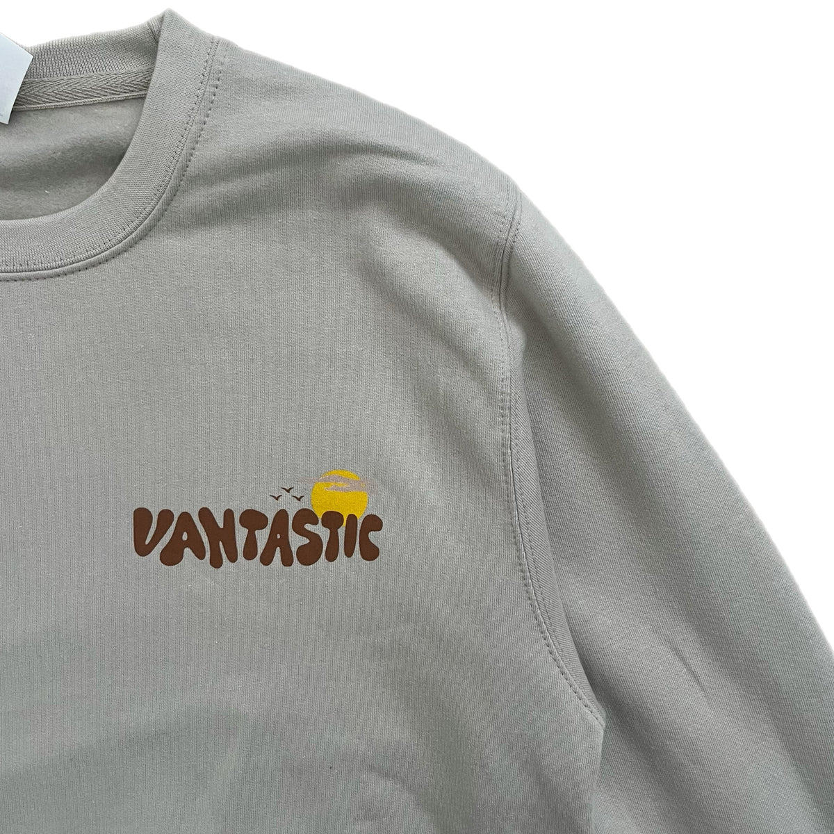 Gray sweatshirt with 'Vantastic' logo on a white background